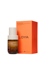 Loya Supercorrect Serum bottle with a white cap next to its bright orange packaging box, set against a solid dark green background.